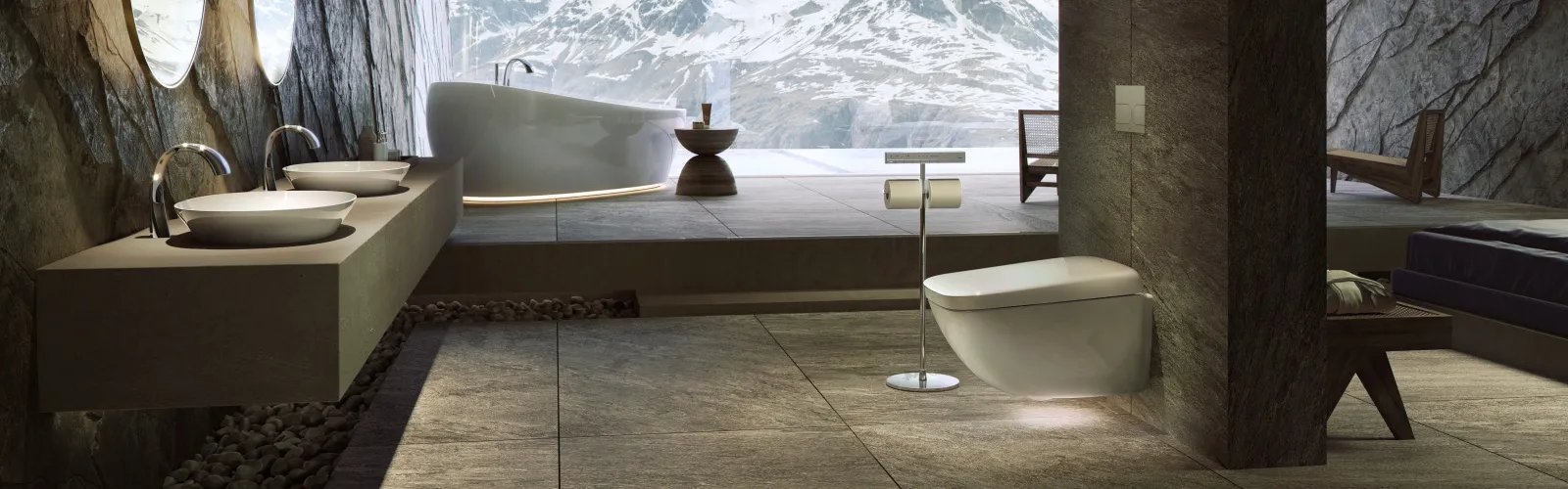 Ein luxuriöses Badezimmer mit einer freistehenden, ovalen Badewanne, die vor einer riesigen Glaswand mit atemberaubendem Blick auf schneebedeckte Berge steht.