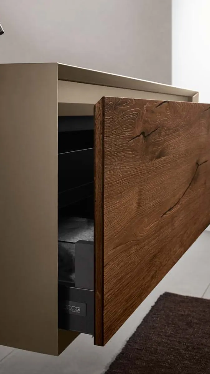 Waschtisch Stocco Iks mit dunklem Holz und geöffneter Schublade.